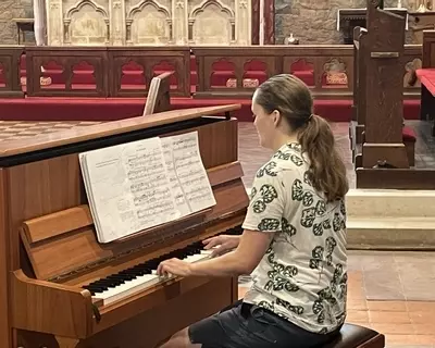 Megan Rushbrook at the piano